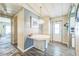 Cozy dining area featuring modern lighting and easy access to the kitchen and living spaces at 97 Parson Dr, Winter Haven, FL 33884