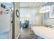 Hallway view showcasing the home's layout, neutral wall color, and convenient access to living spaces at 97 Parson Dr, Winter Haven, FL 33884
