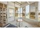 Inviting sunroom with multiple windows, offering views of the surrounding neighborhood at 97 Parson Dr, Winter Haven, FL 33884