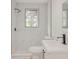 Bathroom featuring a marble-look shower, modern vanity, and sleek black fixtures, creating a spa-like retreat at 1255 Pine St, Altamonte Springs, FL 32701