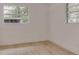 Bright bedroom showcases laminate floors and windows that let in natural light at 1255 Pine St, Altamonte Springs, FL 32701