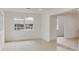 Bright living room features wood-look flooring, windows, and an open layout at 1255 Pine St, Altamonte Springs, FL 32701