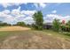 Expansive backyard backing onto a golf course, offering privacy and scenic views at 1890 Flora Pass Pl, Kissimmee, FL 34747