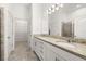 This bathroom includes double sinks and a walk-in shower at 1890 Flora Pass Pl, Kissimmee, FL 34747