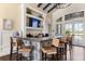 Clubhouse bar with decorative tile, barstools, and tv at 1890 Flora Pass Pl, Kissimmee, FL 34747