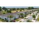 Charming neighborhood street view with well-manicured lawns, sidewalks, and attached garages at 1890 Flora Pass Pl, Kissimmee, FL 34747