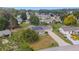 Beautiful aerial view of a single-story home with a well-manicured lawn in a quiet residential neighborhood at 8225 Sw 108Th Street Rd, Ocala, FL 34481