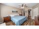 Comfortable bedroom with stylish wood floors, and a large window for natural light at 8225 Sw 108Th Street Rd, Ocala, FL 34481