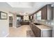 Updated kitchen with stainless steel appliances and fixtures, lots of natural light and lovely tile flooring at 8225 Sw 108Th Street Rd, Ocala, FL 34481
