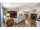 Spacious living room features hardwood floors, vaulted ceilings, and lots of natural light at 8225 Sw 108Th Street Rd, Ocala, FL 34481