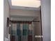 Bathroom featuring a shower with decorative curtain at 8225 Sw 108Th Street Rd, Ocala, FL 34481