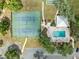 Overhead angle of community amenities: pool, tennis courts, parking, and shuffleboard at 9700 Sw 196 Circle, Dunnellon, FL 34432