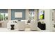 Comfortable living room with stylish seating, soft lighting, and modern decor at 2105 Albatross Nest Dr, Bartow, FL 33830