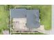 Detailed aerial view showing the home's roof and driveway, highlighting the property's clean landscaping at 629 Orange Valley Ln, Lakeland, FL 33813