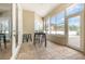 Sunroom area with a table and chairs for seating near the windows at 629 Orange Valley Ln, Lakeland, FL 33813