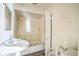 A small bathroom with an older tub, sink, and toilet requires renovation at 303 Clayton Rd, Auburndale, FL 33823