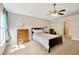 Standard bedroom offering a carpet, window, and neutral paint at 3826 Sleepy Hill Oaks Loop, Lakeland, FL 33810