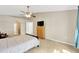 Spacious bedroom with ceiling fan, carpet, and neutral color scheme for ultimate comfort at 3826 Sleepy Hill Oaks Loop, Lakeland, FL 33810