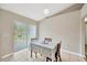 Cozy breakfast nook featuring tile flooring, a table for four, and bright natural light at 3826 Sleepy Hill Oaks Loop, Lakeland, FL 33810