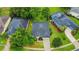 Aerial view of home showing landscaping and surrounding neighborhood at 3897 Beacon Ridge Way, Clermont, FL 34711