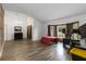 Spacious living room with plenty of natural light and hard wood floors at 722 Swaying Palm Dr, Apopka, FL 32712