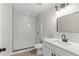 Stylish bathroom features a walk-in shower and modern vanity with sink and stylish fixtures at 837 E Edgewood Dr, Lakeland, FL 33803