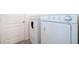 Functional laundry area featuring a washer and dryer for convenient laundry tasks at 27 Perch Dr, Kissimmee, FL 34759
