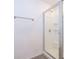 Modern walk-in shower with a clear glass enclosure, sleek hardware, and tiled flooring at 27 Perch Dr, Kissimmee, FL 34759