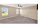 Spacious bedroom with large windows offering beautiful views at 271 Inman Blvd, Winter Haven, FL 33881