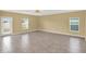 Inviting open space with neutral tones, featuring a large window and sliding glass doors that let in plenty of natural light at 271 Inman Blvd, Winter Haven, FL 33881