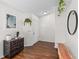 Foyer with a decorative bench, antique chest and a minimalist design at 4462 Iris S St, Lakeland, FL 33813