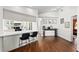 Modern kitchen featuring a breakfast bar with bar stool seating and a dining area at 4462 Iris S St, Lakeland, FL 33813