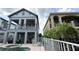 Spacious backyard with pool, spa, and outdoor kitchen area for the ultimate entertainment at 7810 Whitemarsh Way, Reunion, FL 34747