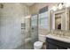 Beautiful bathroom with a glass walk-in shower and granite countertop vanity at 9080 Morgana Ct, Winter Garden, FL 34787