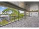 Spacious screened patio overlooking lush backyard and lake at 9080 Morgana Ct, Winter Garden, FL 34787