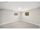 Inviting bedroom showcasing carpet, natural light from windows, and neutral decor at 1022 Baycrest Dr, Lakeland, FL 33805