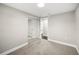 Bedroom with mirrored closet and carpet offers a bright and neutral living space at 1022 Baycrest Dr, Lakeland, FL 33805