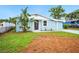 Charming single-story home with a well-maintained lawn and fresh landscaping in a quiet residential neighborhood at 1022 Baycrest Dr, Lakeland, FL 33805