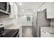 Renovated kitchen featuring new appliances, granite countertops, and ample cabinet space, perfect for cooking at 1022 Baycrest Dr, Lakeland, FL 33805