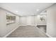 A versatile living room with new flooring and ample space for relaxing and entertaining at 1022 Baycrest Dr, Lakeland, FL 33805