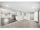 Spacious living area adjacent to a modern kitchen, creating an open and inviting atmosphere at 1022 Baycrest Dr, Lakeland, FL 33805