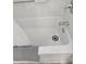 Clean bathroom featuring a white tub and shower with chrome fixtures and neutral accents at 7601 Canada Ave # 220, Orlando, FL 32819