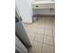 Bathroom with a trash can and tiled floor at 7601 Canada Ave # 220, Orlando, FL 32819