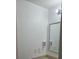 Bathroom featuring neutral-toned tile flooring and modern vanity with storage at 7601 Canada Ave # 220, Orlando, FL 32819