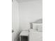 Bright bedroom featuring a white nightstand next to a bed with white bedding at 7601 Canada Ave # 220, Orlando, FL 32819