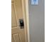 Keypad lock on a door with a wall plate showing '220' at 7601 Canada Ave # 220, Orlando, FL 32819
