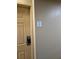 The exterior door shows unit 220, and features a modern digital lock at 7601 Canada Ave # 220, Orlando, FL 32819