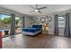 Bedroom featuring sliding glass doors leading to a pool area at 107 Elm N Sq, Lakeland, FL 33813