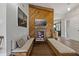 Cozy living room features a wood-paneled fireplace and a comfortable seating arrangement at 107 Elm N Sq, Lakeland, FL 33813