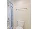 Well-lit bathroom with a bathtub and shower with patterned curtains at 1423 Bunker Dr, Davenport, FL 33896